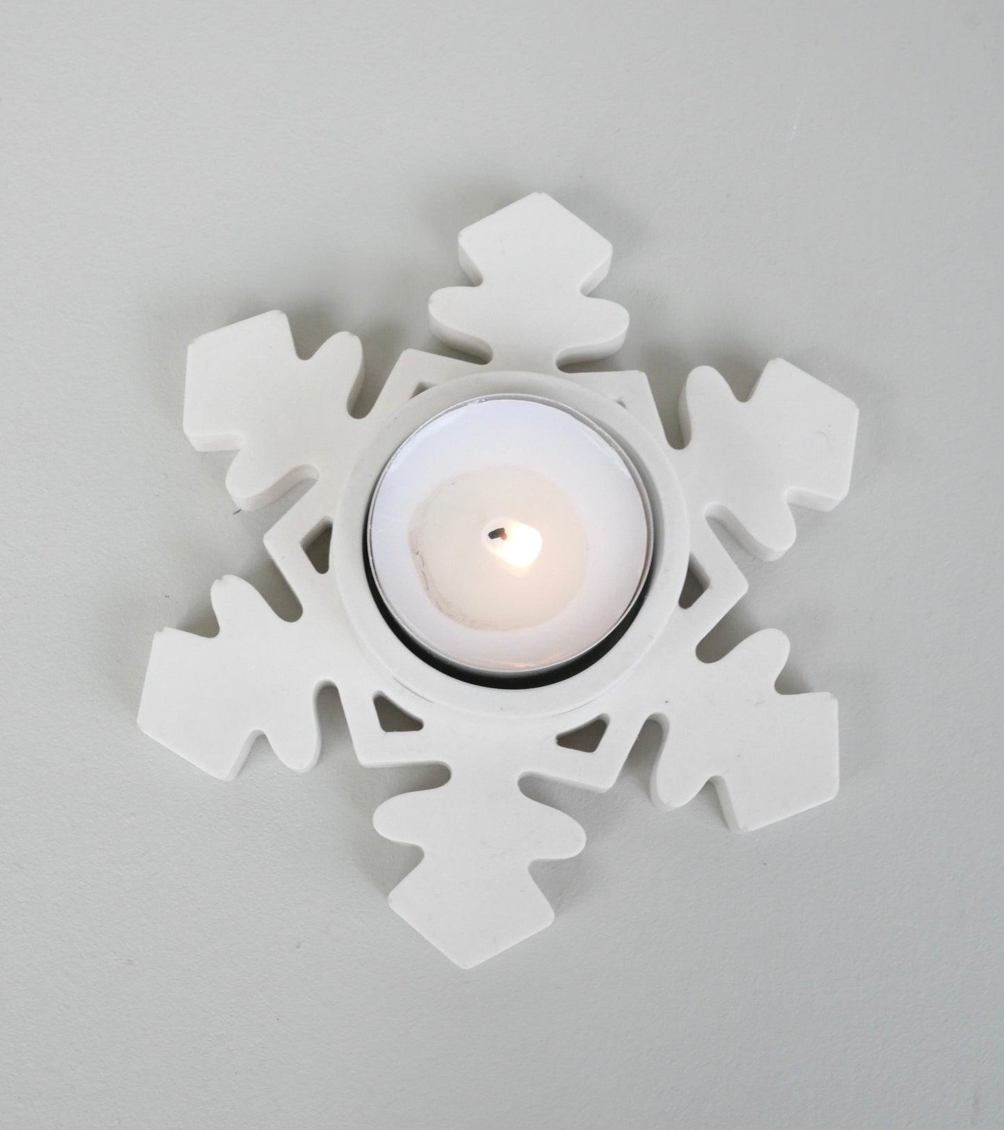 Snöstjärna värmeljus