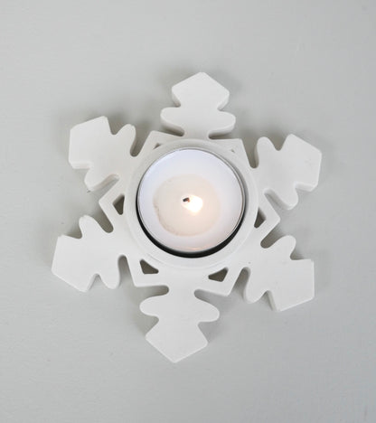 Snöstjärna värmeljus